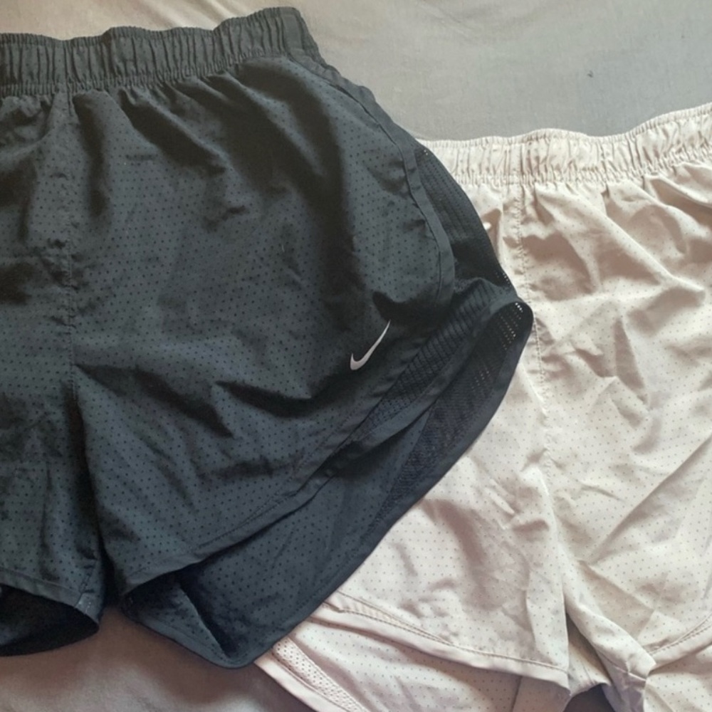 *ISO*WOMEN NIKE BLACK AND TAN COOL DRI FIT SHORTS WITH Perforation on the short!